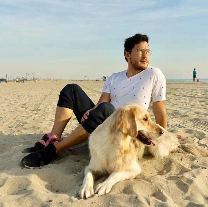 An image of markiplier and Chica the dog