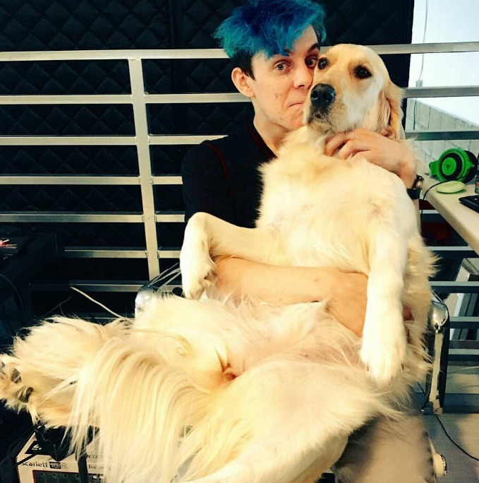 An image of markiplier and Chica the dog