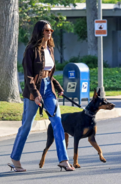 An image of Kendall Jenner and her Doberman, Pyro