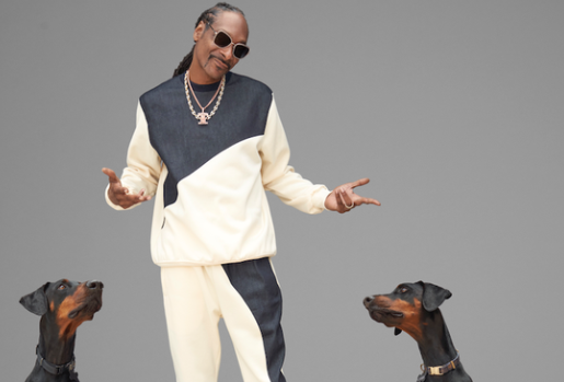 An image of Snoop Dogg and his dog