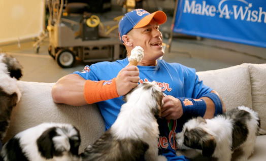 An image of John Cena  and Dog: