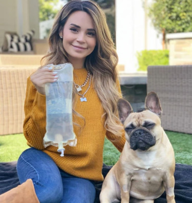 An image of Rosanna Pansino and her dog