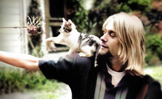An image of Kurt Cobain and his Cat