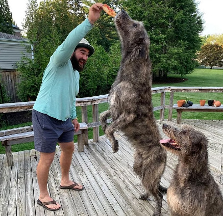 An image of Jason Kelce with his Dogs