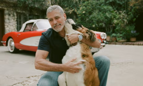 An image of George Clooney with his Dog