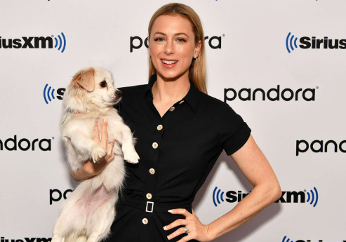 An image of Iliza Schlesinger with her Dog