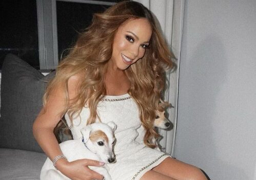 An image of Mariah Carey with her Dog